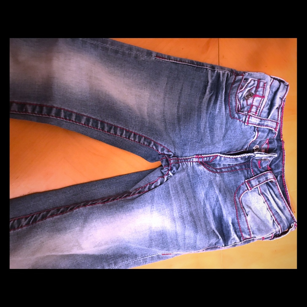 Girls true religion jeans with purple stitching